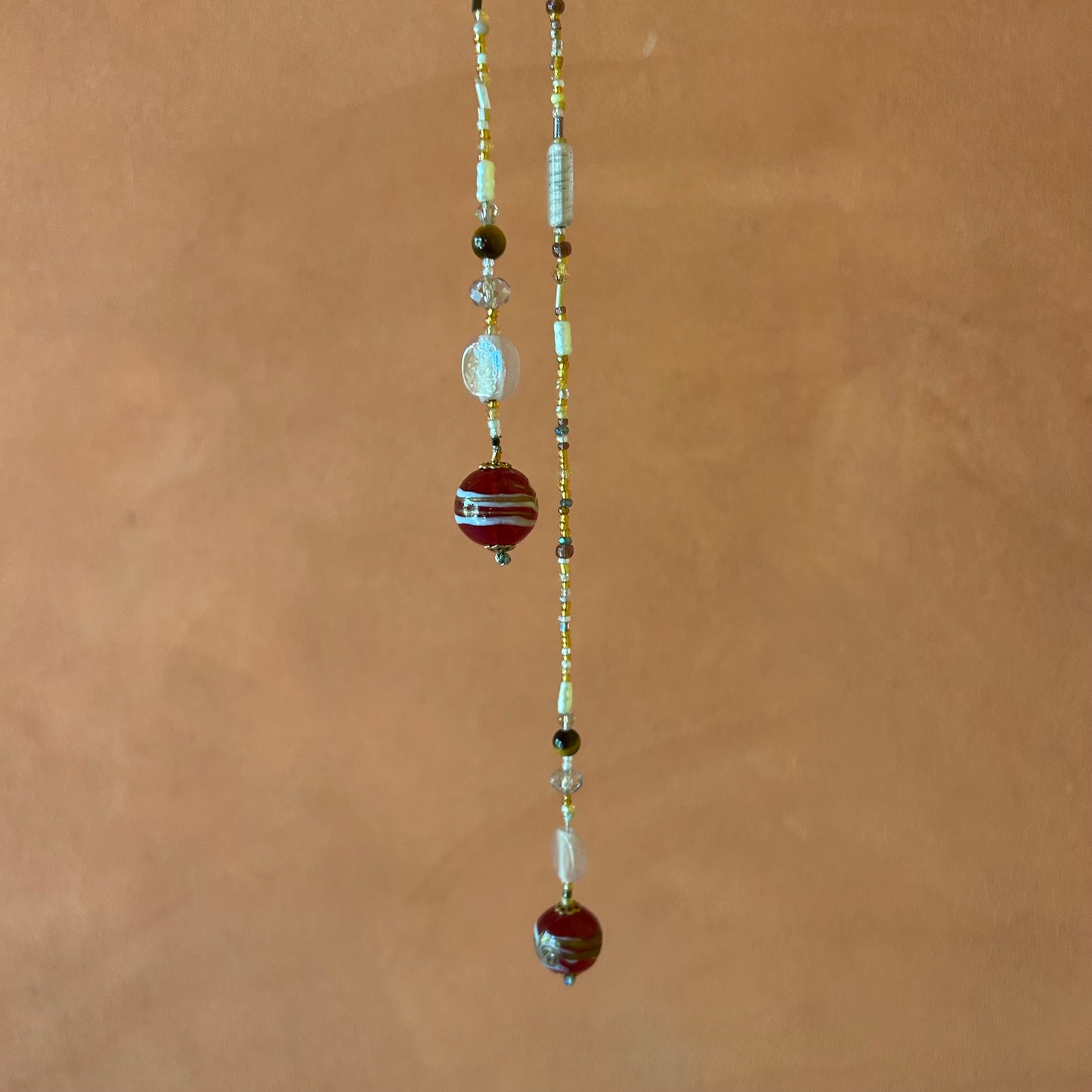 Collana aperta con sfere di Murano