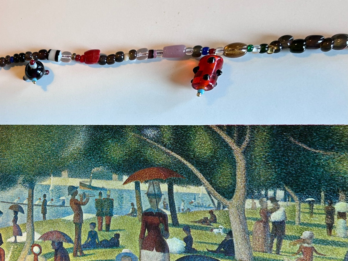 Collana “foglie, cachi, castagne e pianeti”
