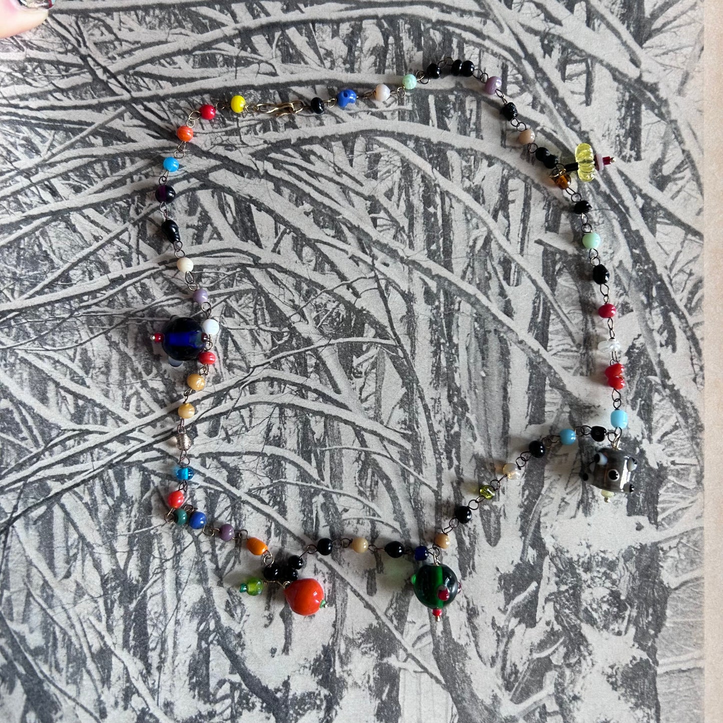 Collana incatenato “pianeti, mine e fruttini”