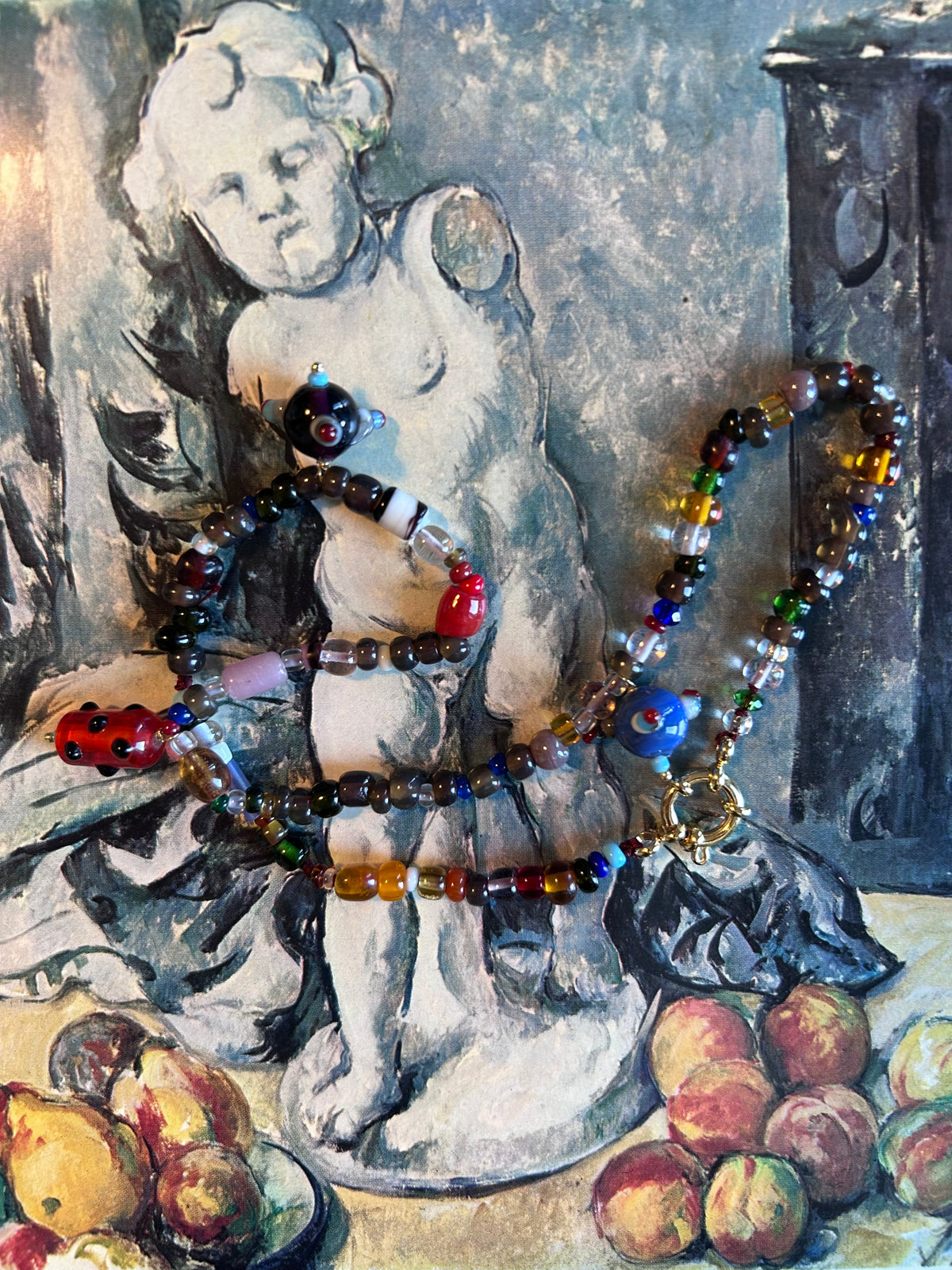 Collana “foglie, cachi, castagne e pianeti”