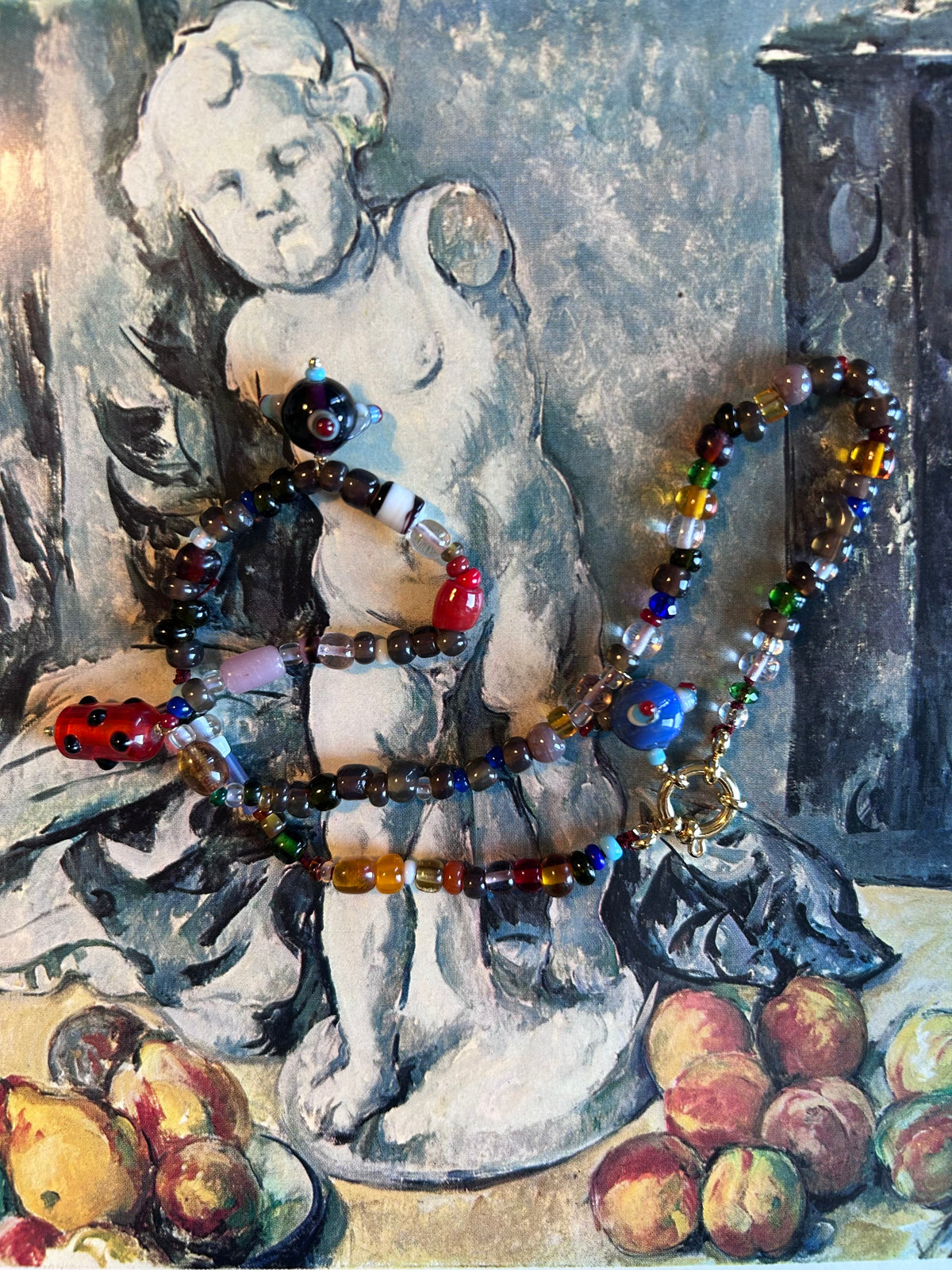 Collana “foglie, cachi, castagne e pianeti”