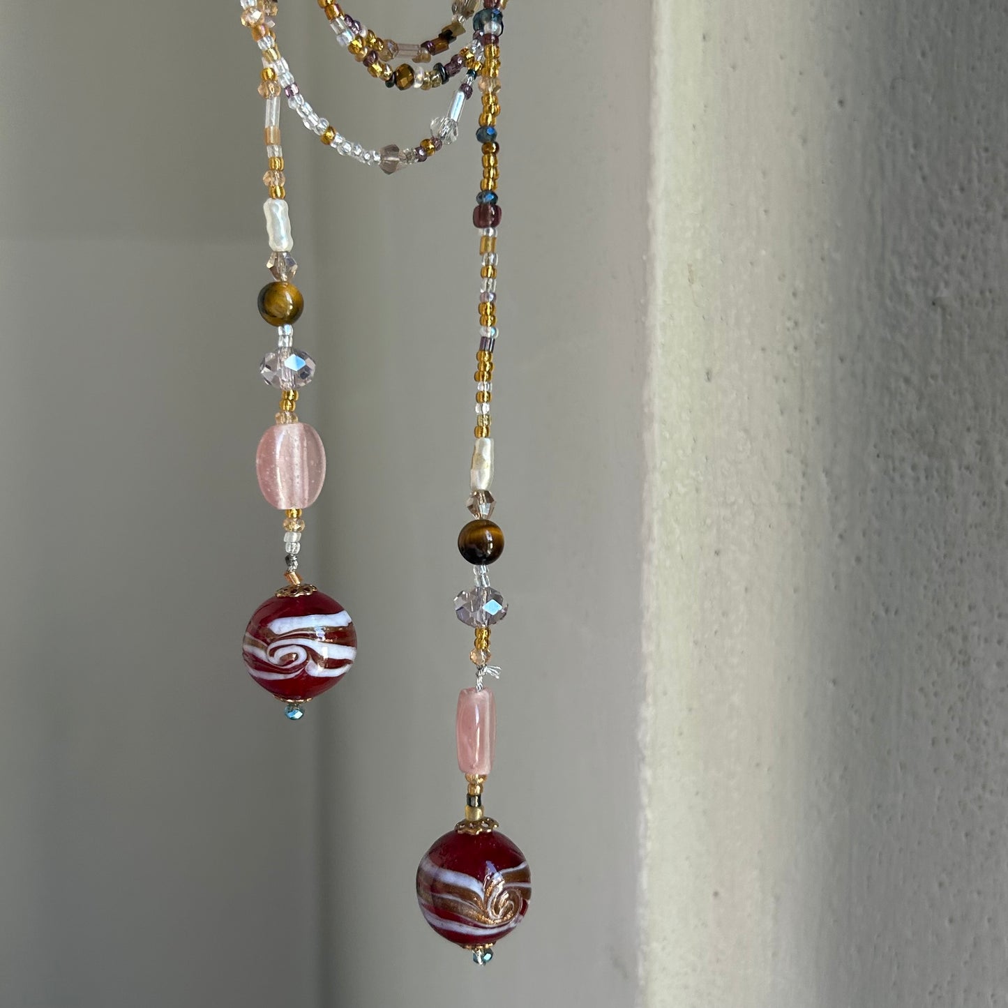 Collana aperta con sfere di Murano