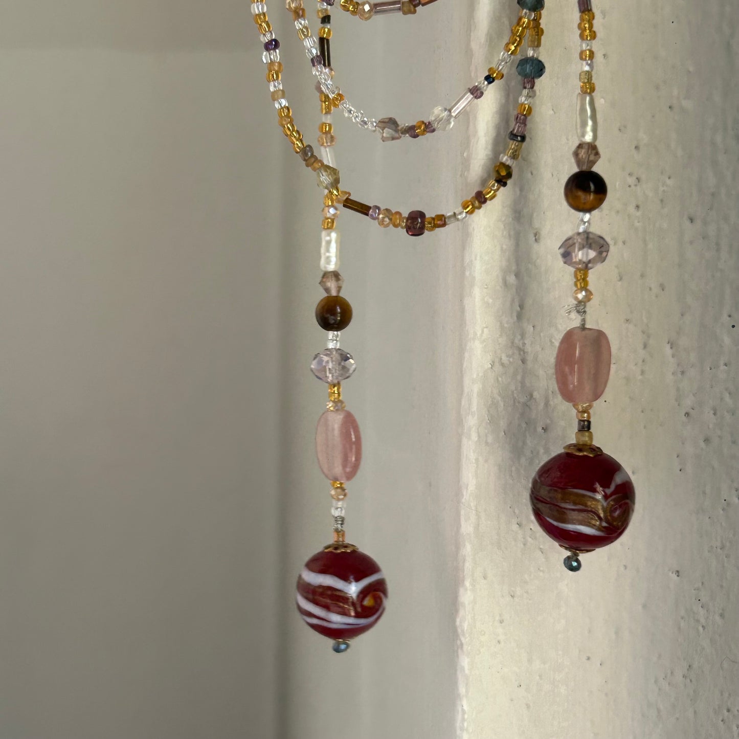 Collana aperta con sfere di Murano