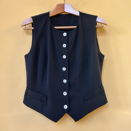 Gilet con bottoni a fiore